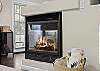 The living room includes a gas fireplace, a smart TV, and plenty of seating. 