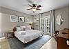 Unwind in this spacious king bedroom with a Smart TV and en suite bathroom.