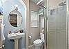 Guest bathroom with a walk-in shower.
