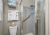 Guest bathroom with a walk-in shower.