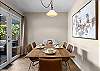 Gather around the table and enjoy a meal together! The dining area sits 6 people. 
