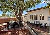 A fully fenced backyard with outdoor seating, a grill, hot tub, cornhole, and a basketball hoop! Plenty of space for your crew and your pets to roam.