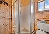 Our second level ensuite bathroom has a spacious vanity with soaking tub and walk-in shower. 