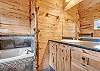 Our second level ensuite bathroom has a spacious vanity with soaking tub and walk-in shower. 