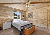 Our spacious and bright main level queen bedroom. 