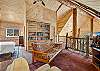 Our open loft offers comfort and relaxation with a futon, Smart TV and lots of books.
