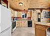 Our home offers a light and bright cozy mountain cabin.  Our home features a cozy kitchen that opens to the living room and dining area.