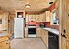 Our home offers a light and bright cozy mountain cabin.  Our home features a cozy kitchen that opens to the living room and dining area.