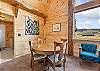 Enjoy gathering around the dining table and enjoying the mountain views that surround you. 