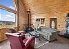 Our home offers a light and bright cozy mountain cabin.  Our home features lots of windows, a wood burning fireplace, and open living, dining and kitchen concept. 