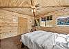 Our spacious and bright main level queen bedroom. 