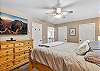 Our main level master suite offers a king bed, Smart TV and en-suite bathroom. 
