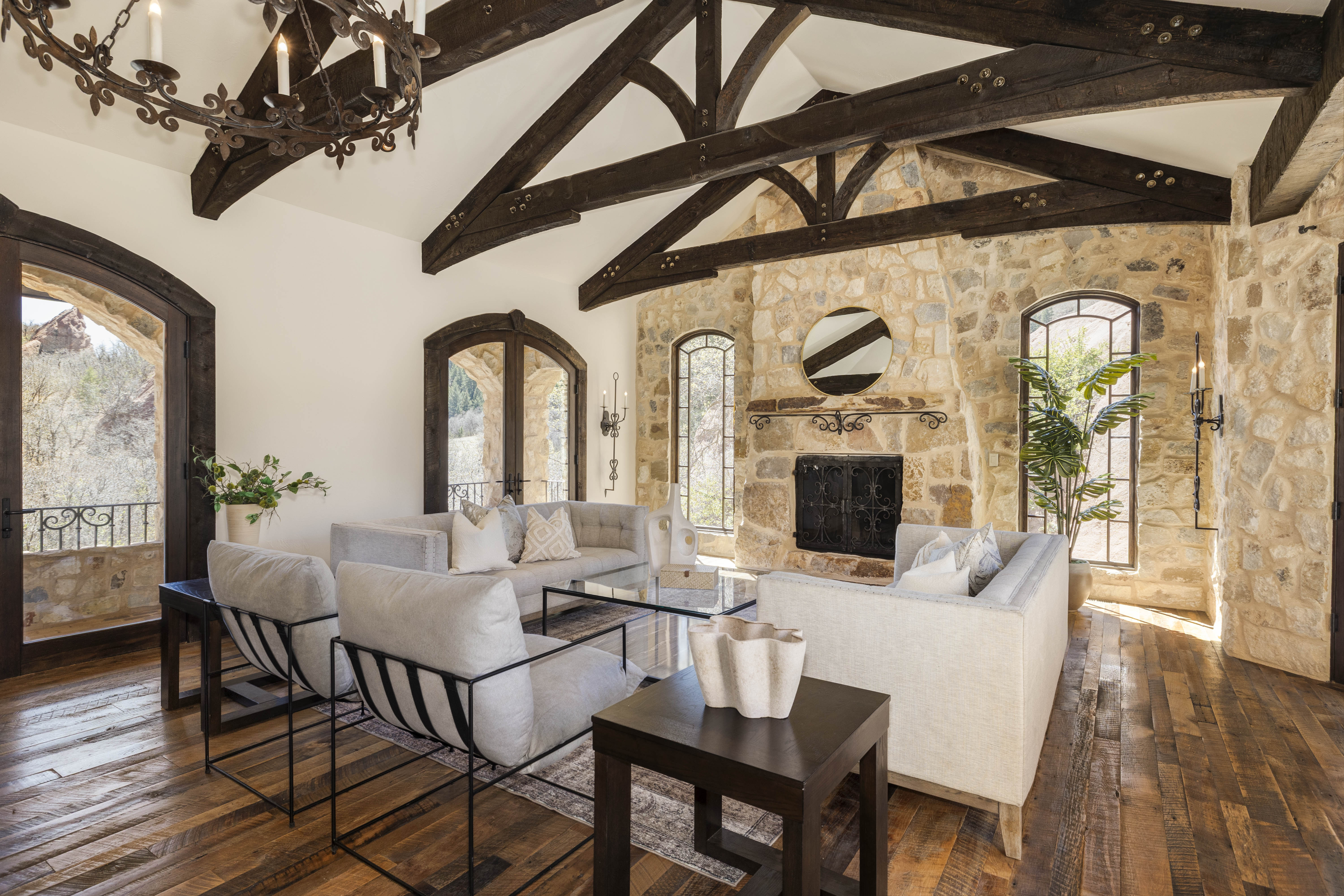 Sitting area with fireplace and piano.
