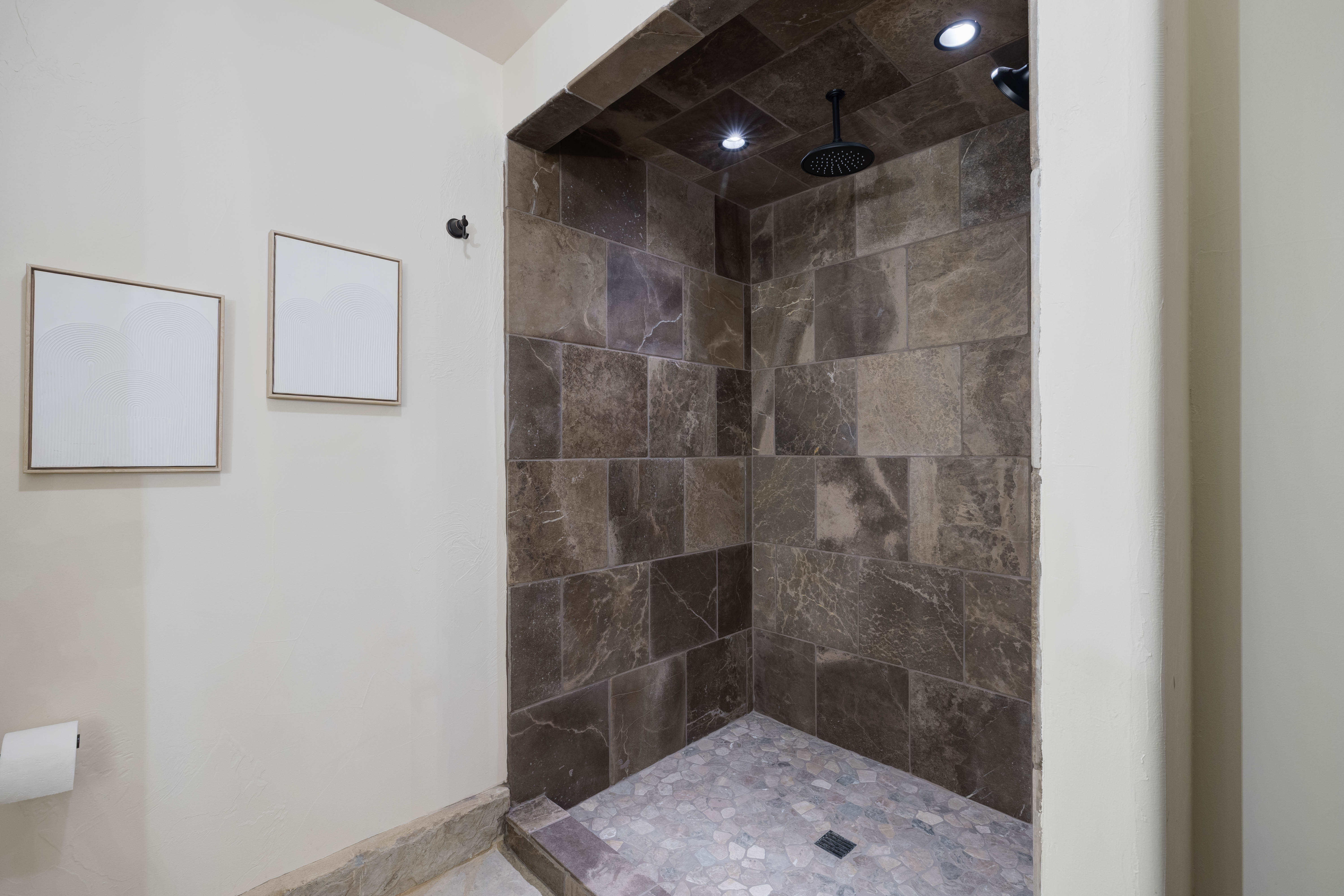 Seventh full bathroom located in the downstairs area.