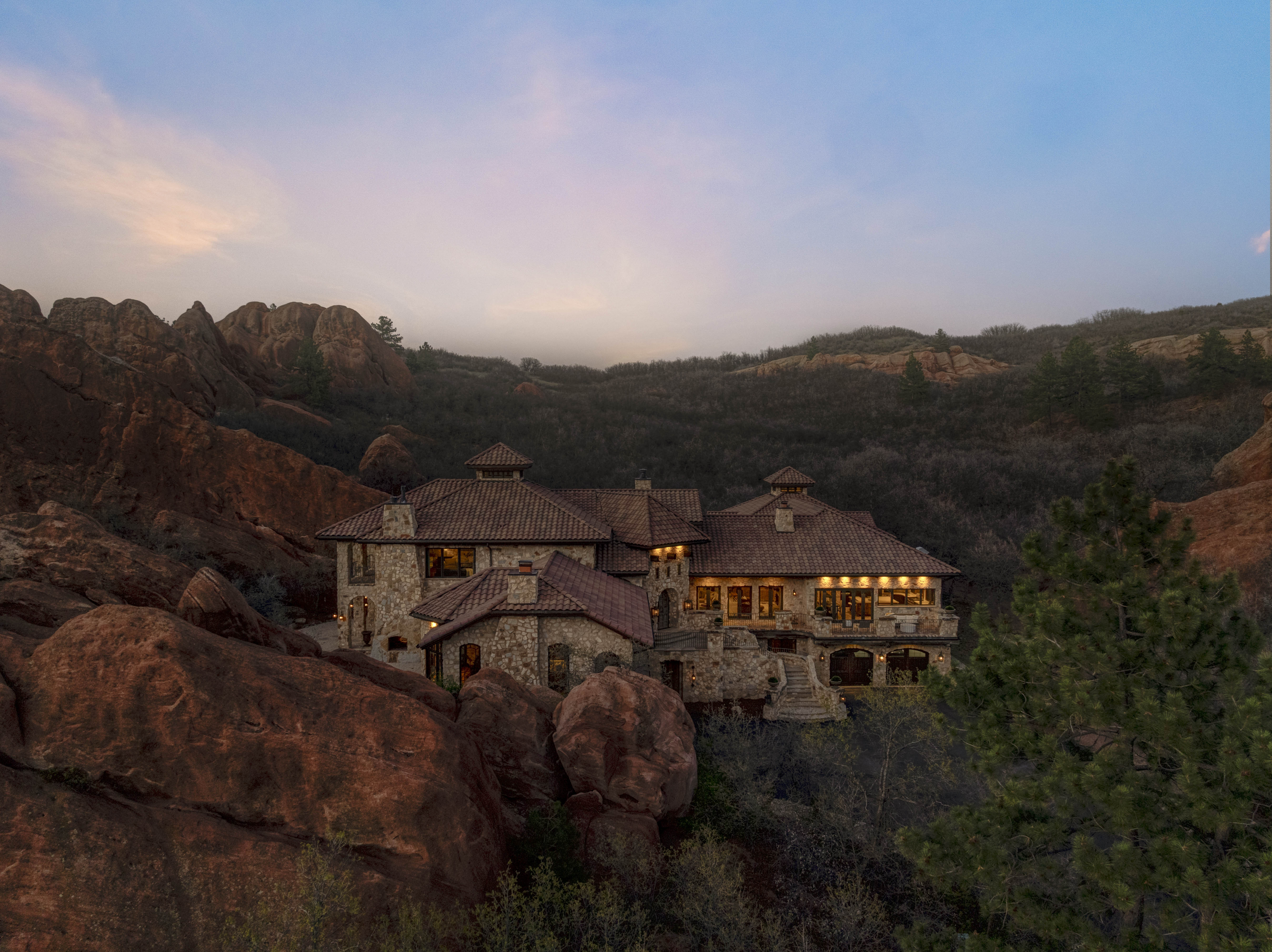 The estate sits nestled among towering red rock, with views in every direction.