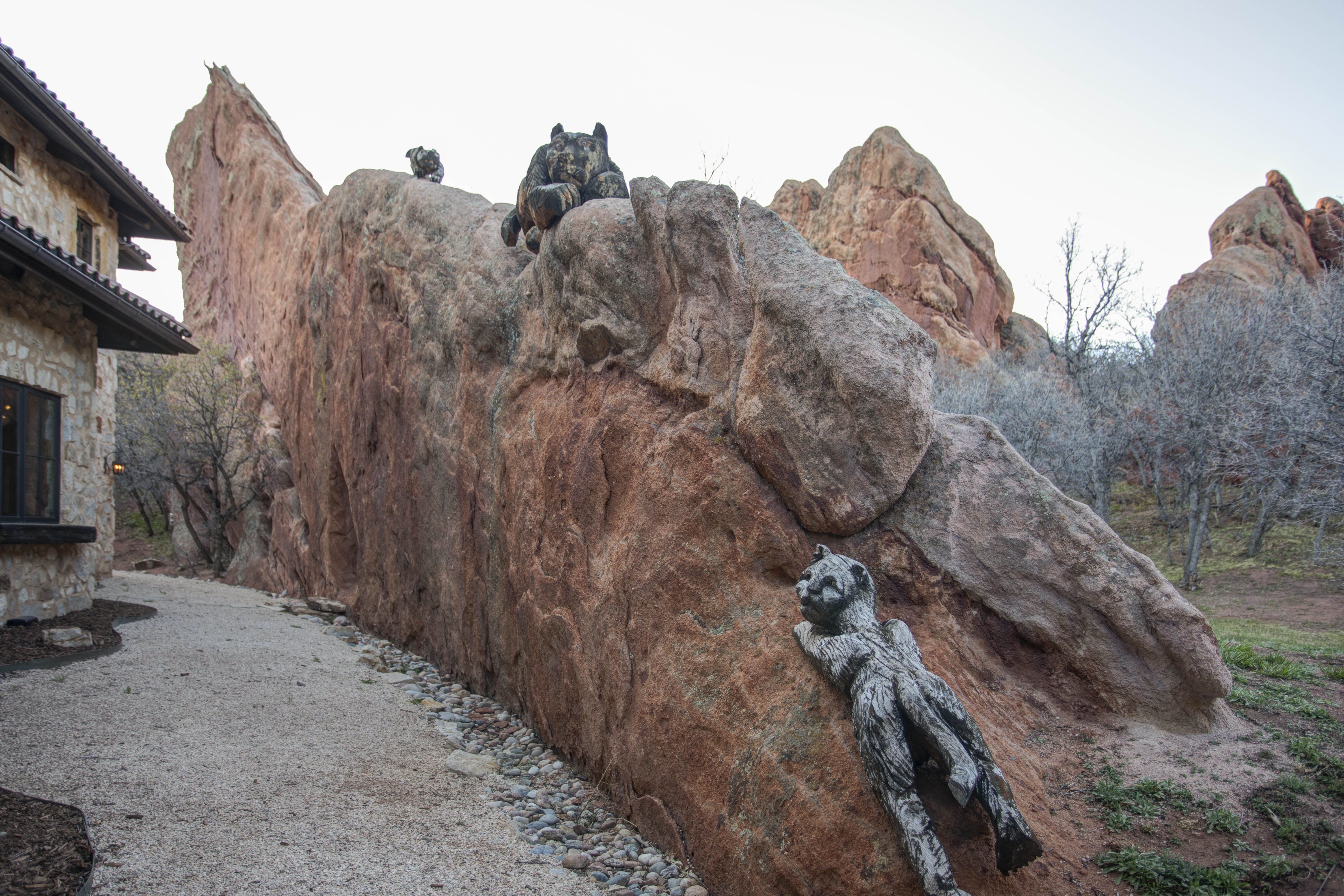 Keep an eye out for the hand-carved animal sculptures woven into the natural red rock around the home. 