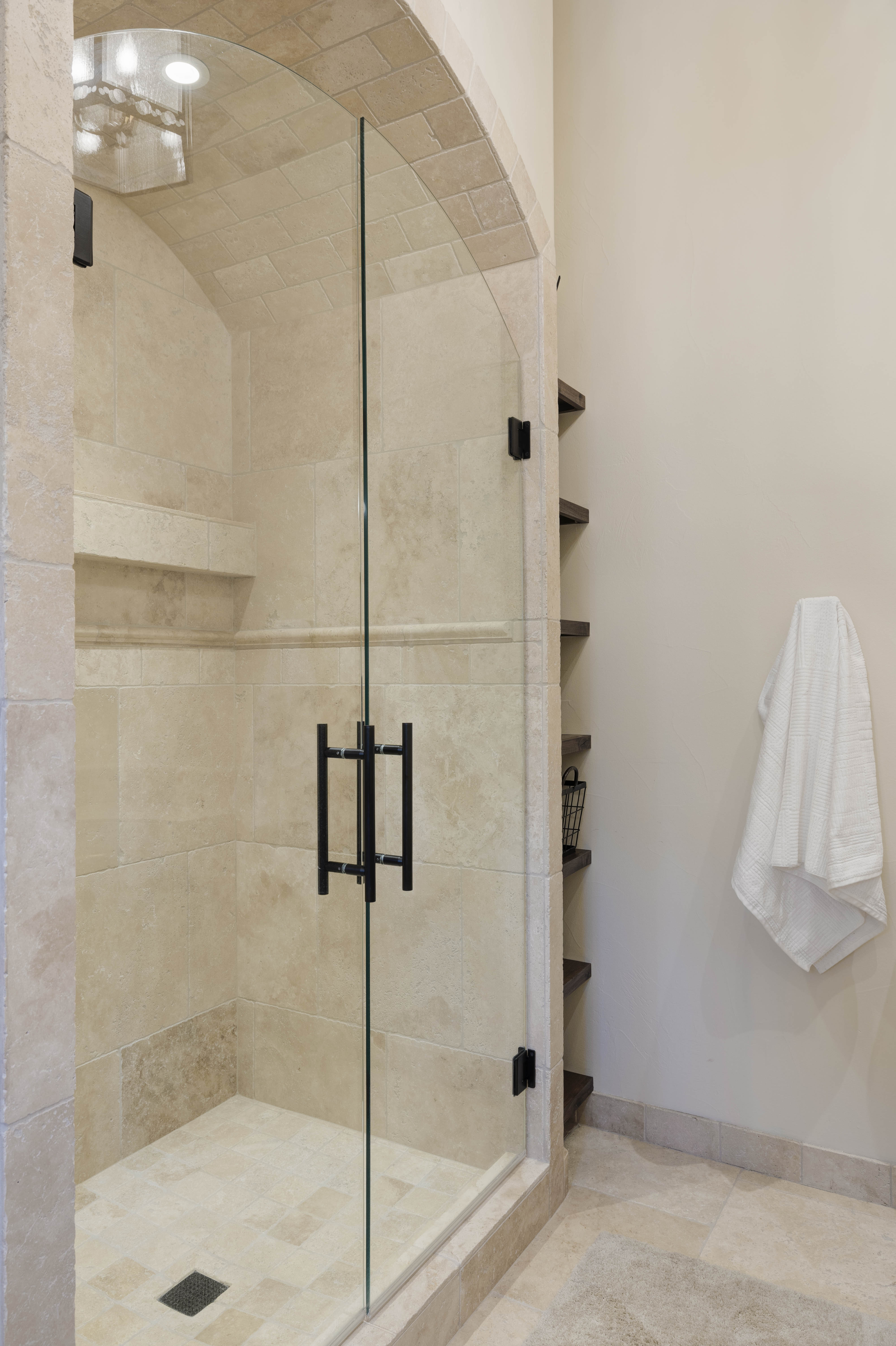 En suite bathroom with a copper tub and walk-in shower.
