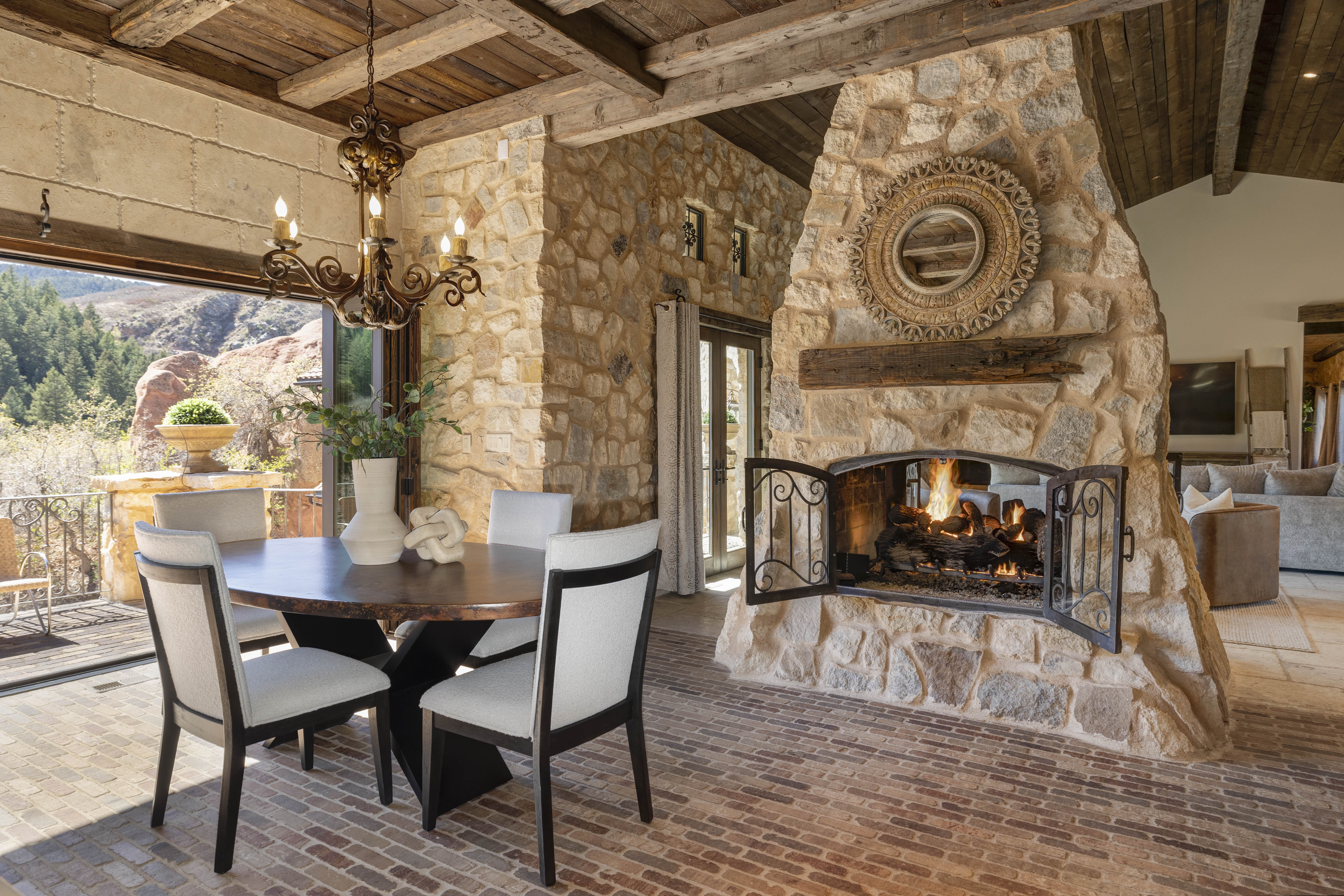 A double-sided fireplace brings warmth and style to both the living room and kitchen area. 
