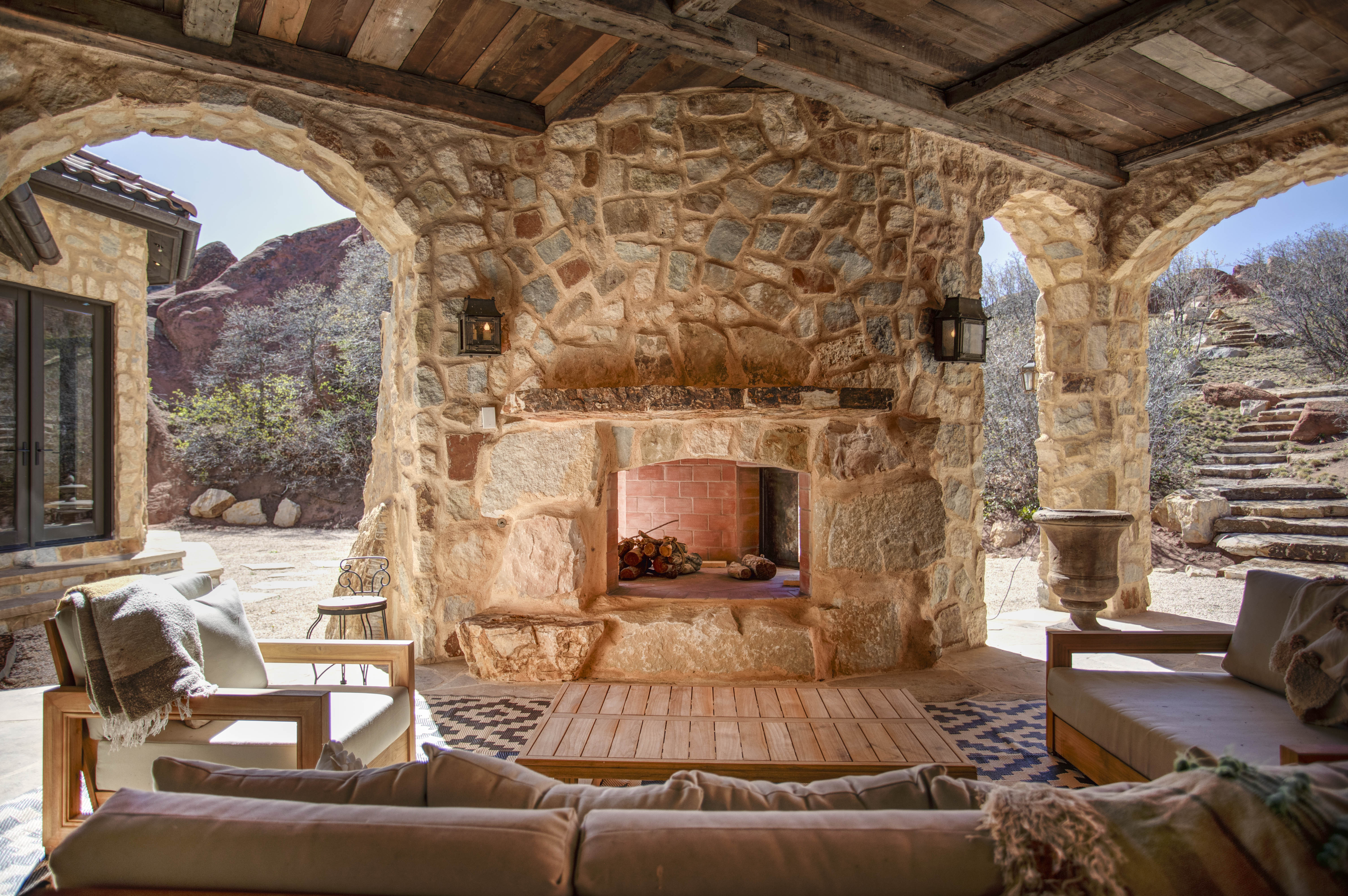 Gather on the outdoor patio as the sun sets over the red rocks.