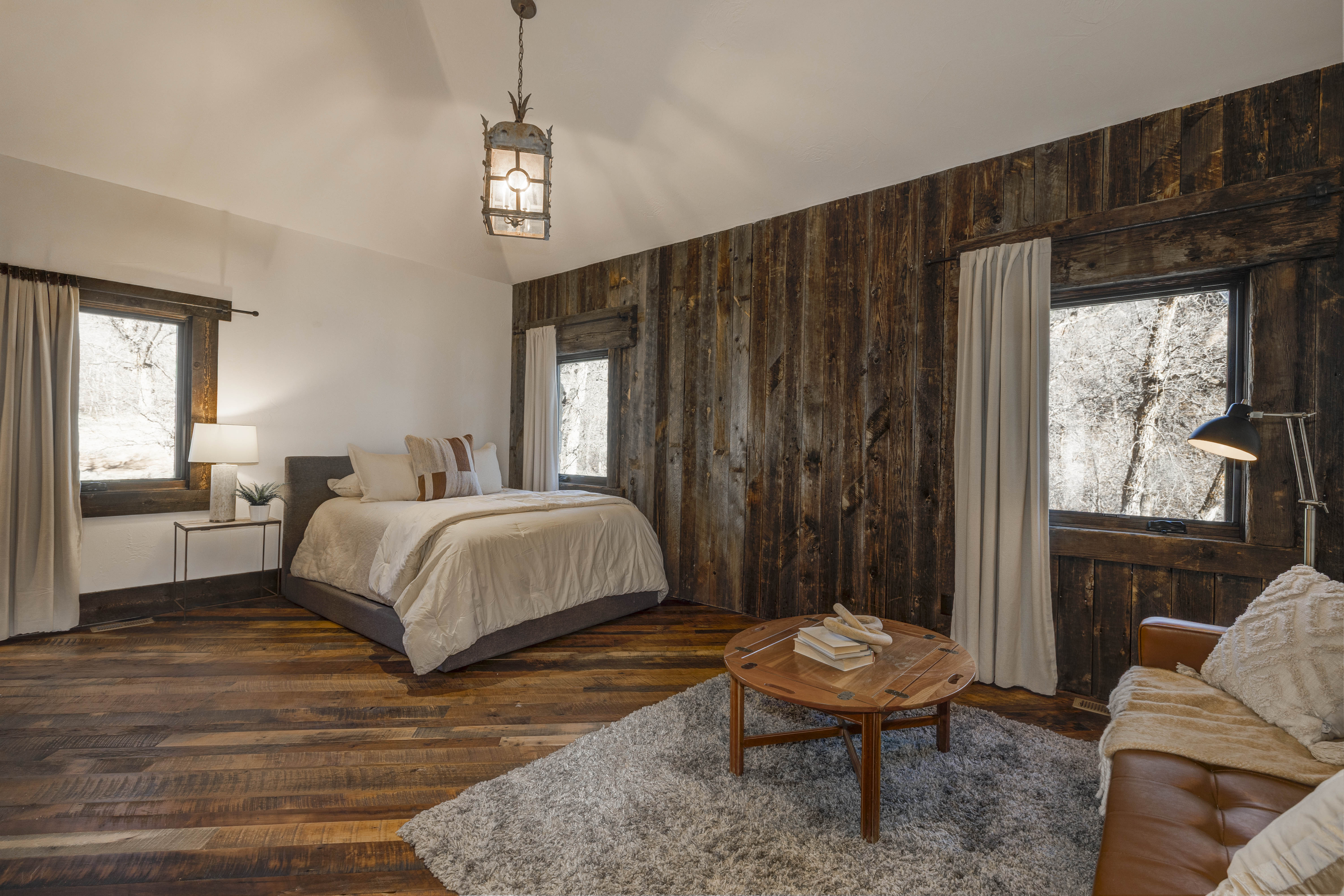 Queen bedroom #4 with a lounge area and its own en suite bath.