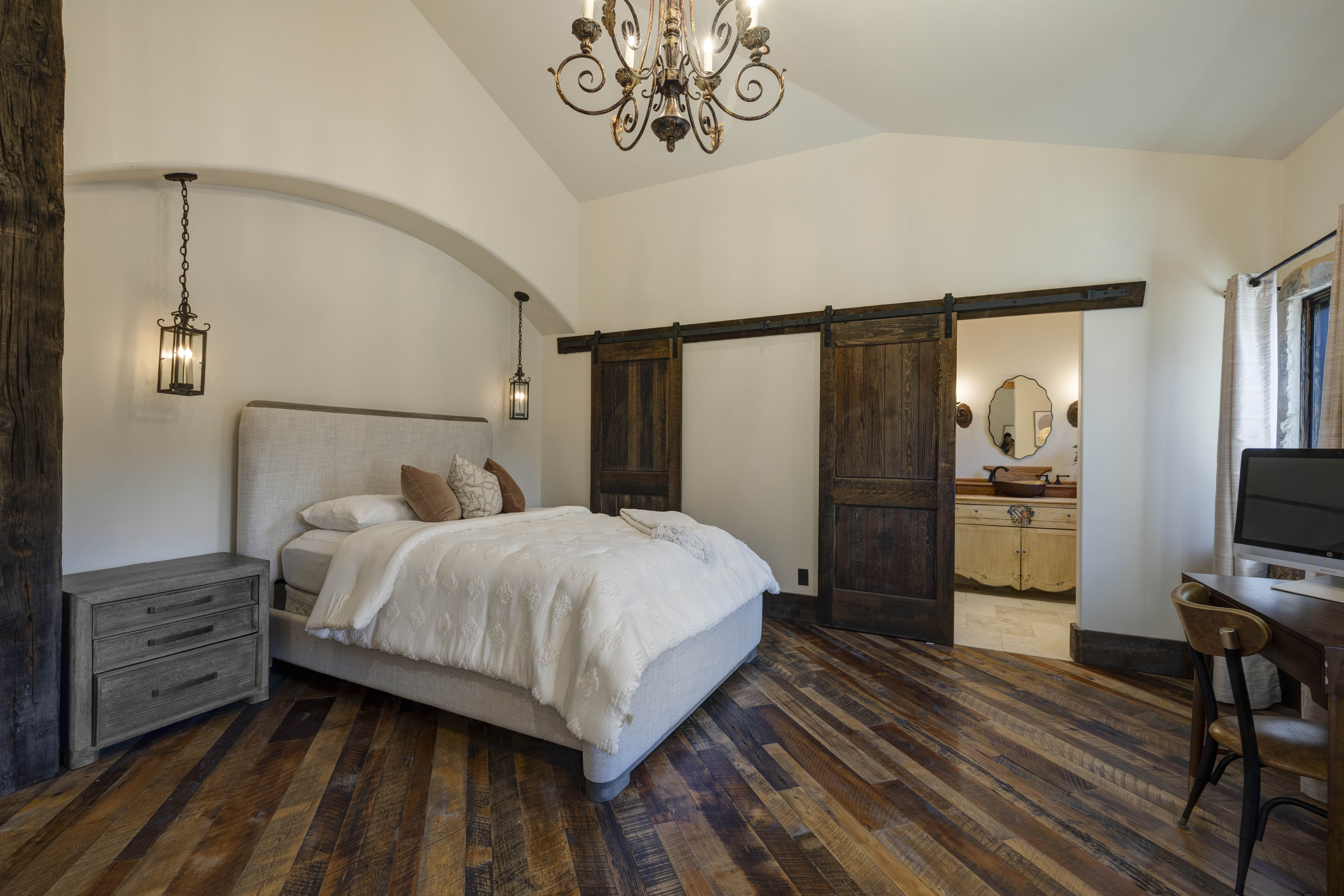 Queen bedroom #1 with its own en suite bath — privacy for every guest. 