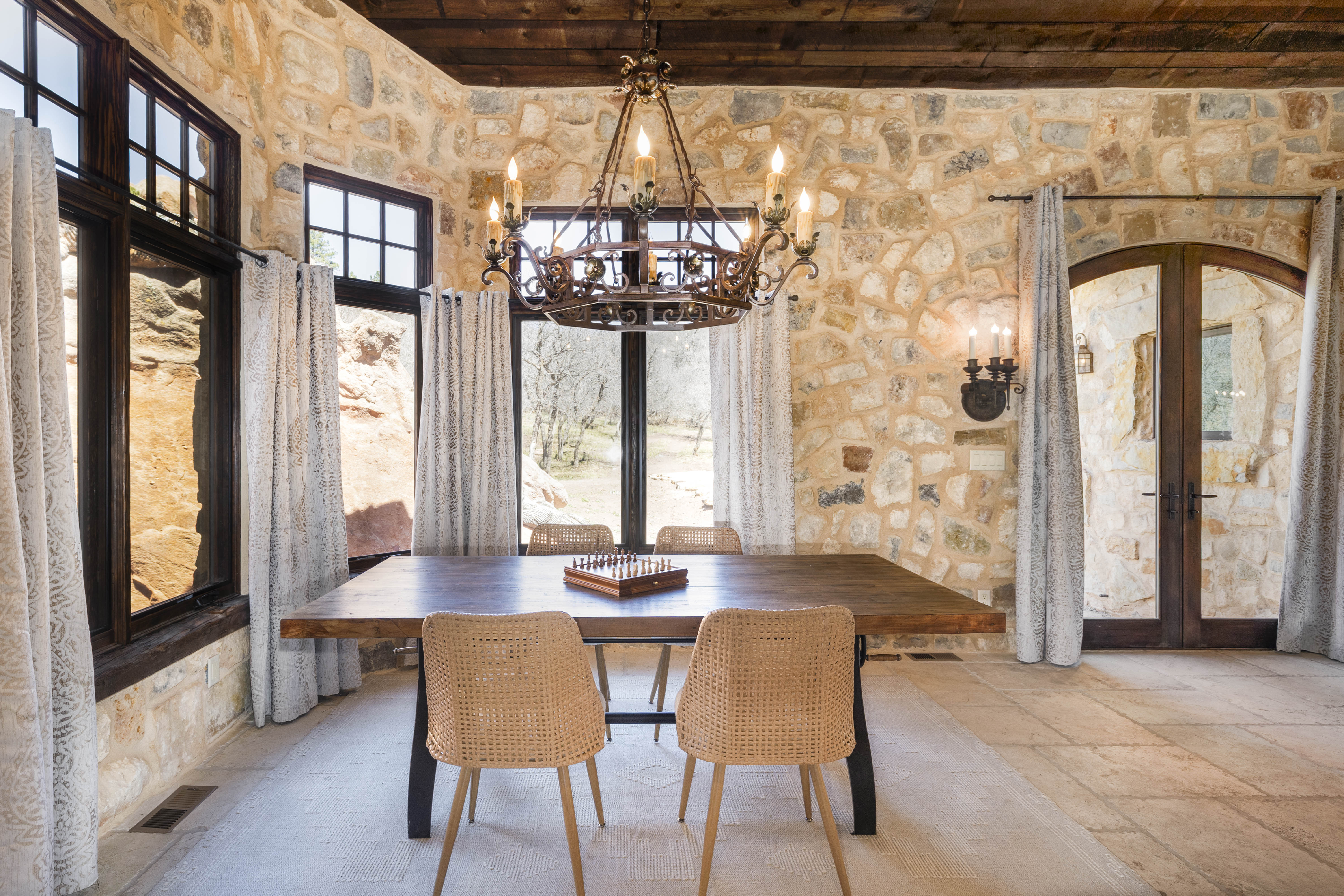 Gather around the table in the living room to play a board game or enjoy a cup of coffee.