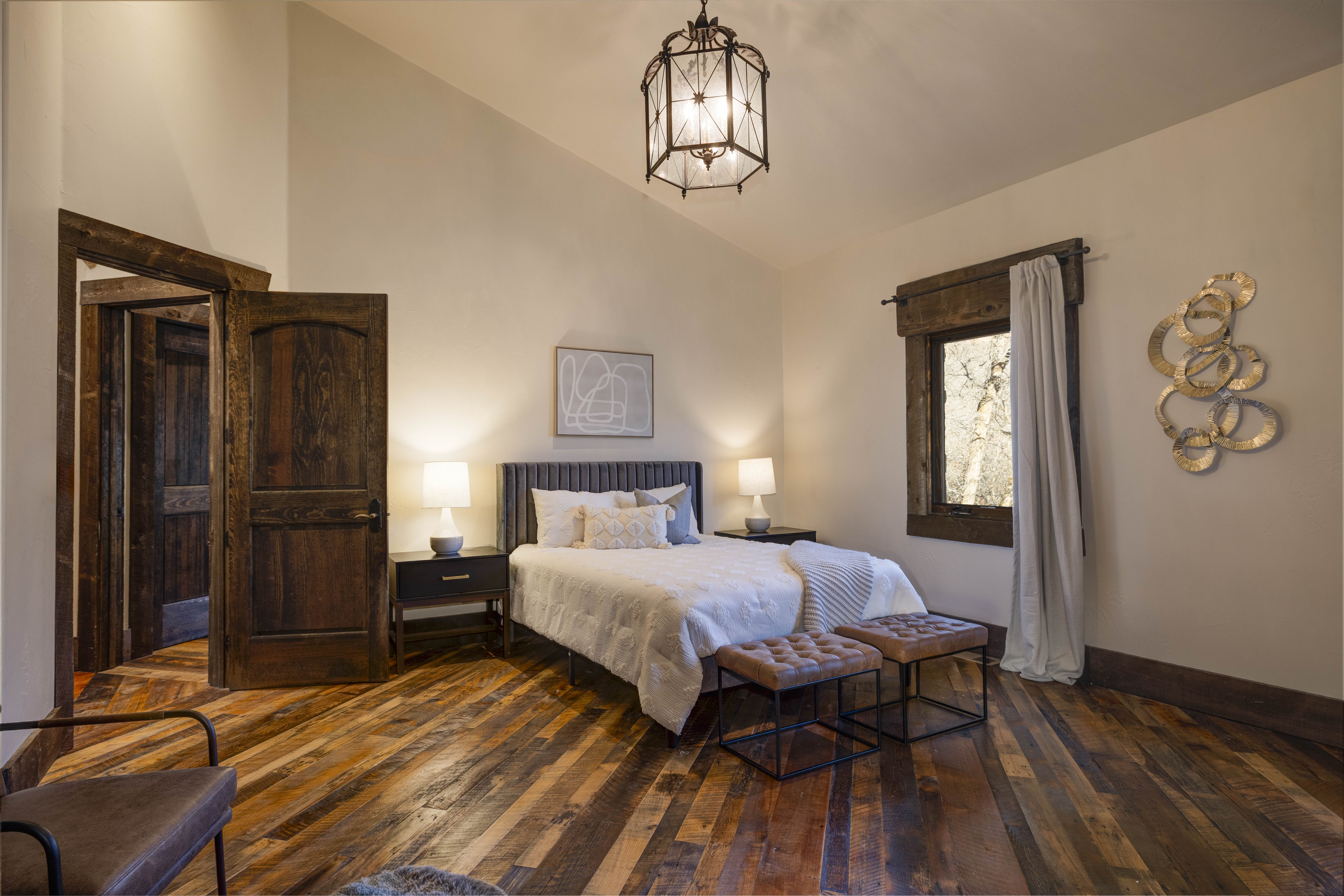 Queen bedroom #3 with a lounge area and its own en suite bath.