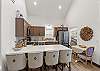 Breakfast bar seating for 4 and dining table for 2.