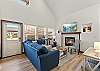 Cozy up next to the fireplace or watch your favorite show on the Smart TV in the living room.