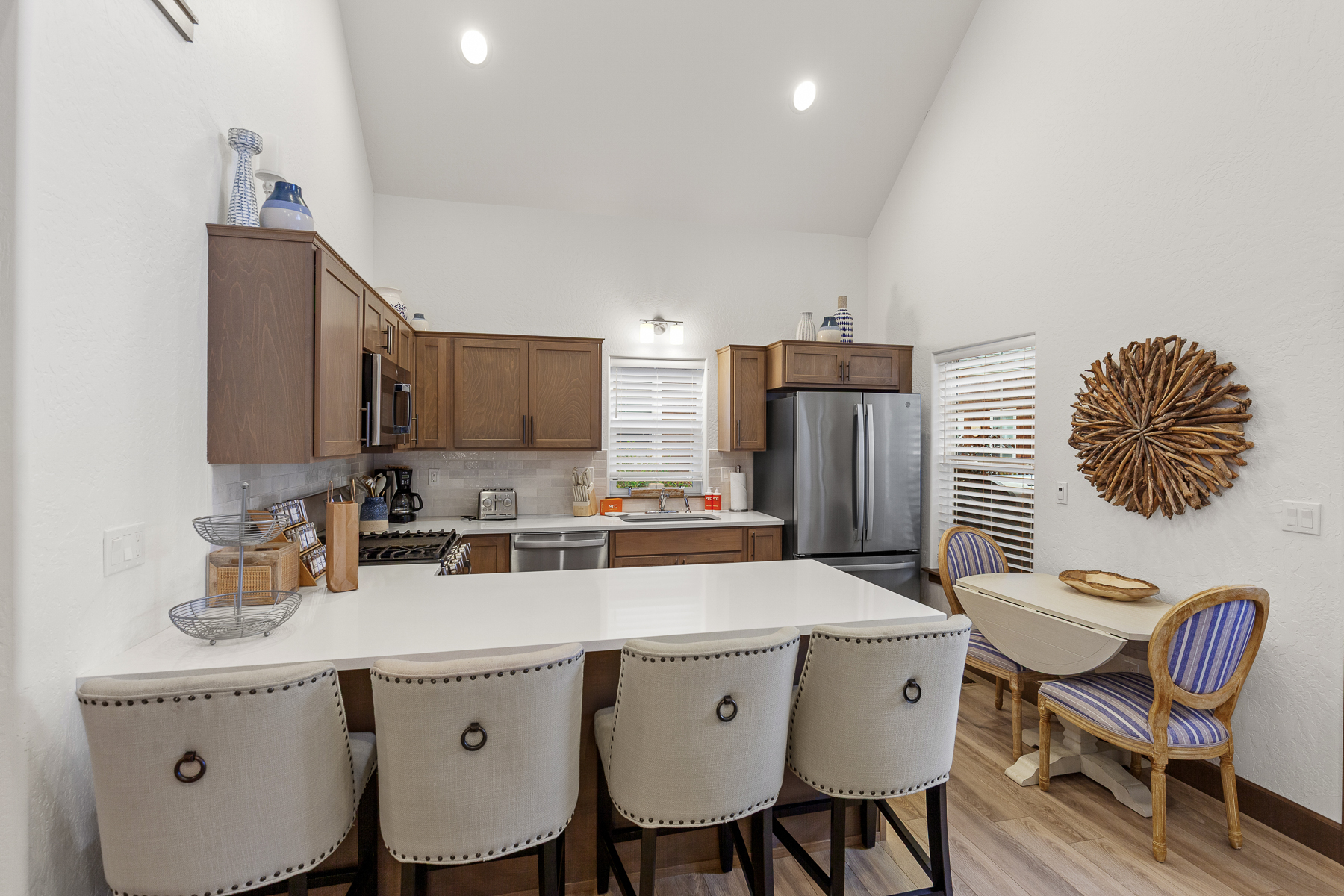 Breakfast bar seating for 4 and dining table for 2.