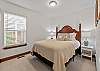 Relax and recharge in this cozy queen bedroom retreat.