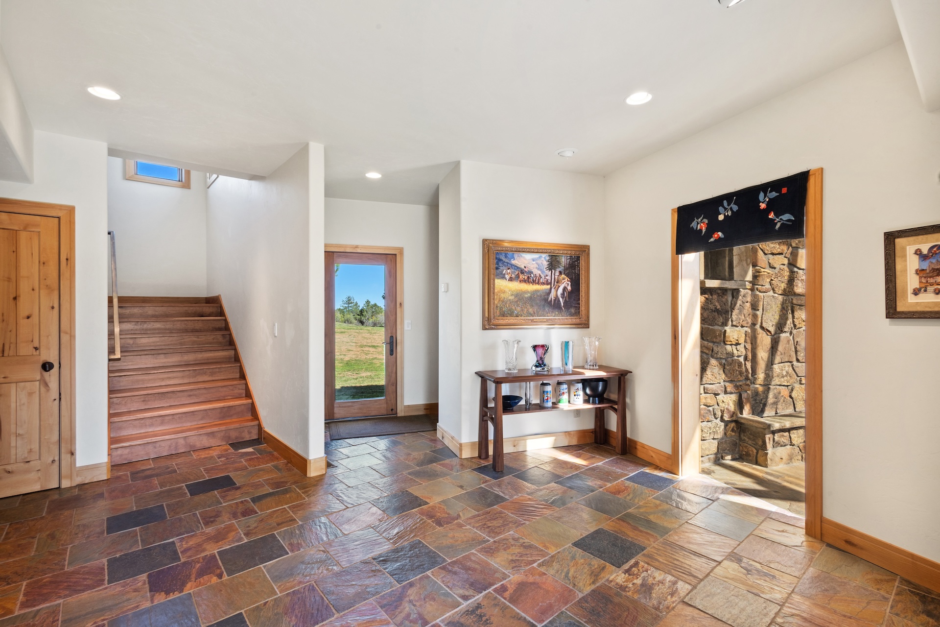 The entryway to the home. Hang out in the green house or head upstairs to the main living area. 