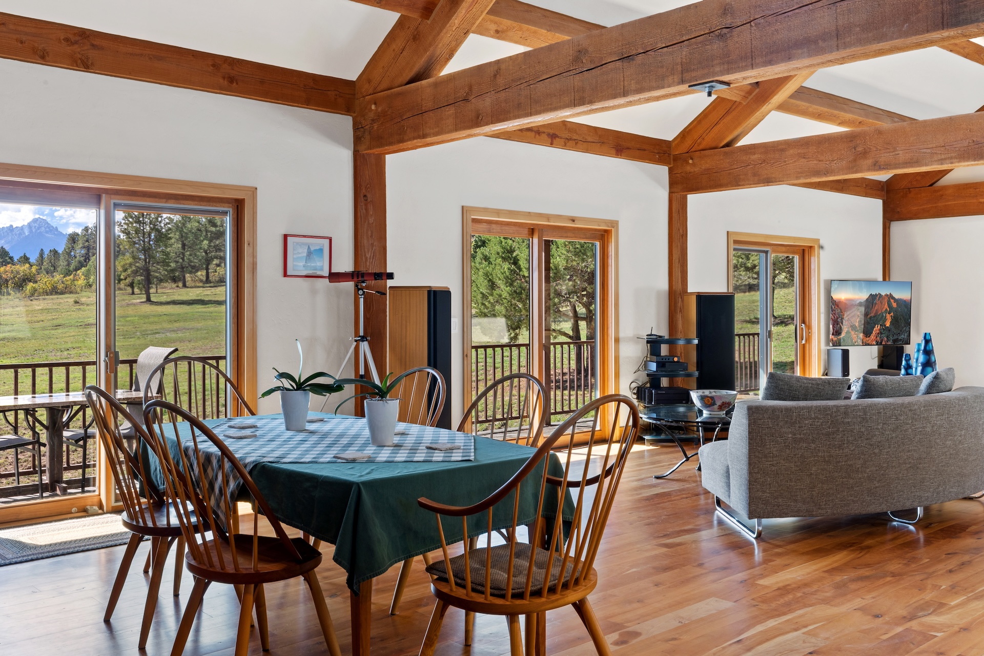 Custom-crafted Thos. Moser cherry dining table with seating for six.