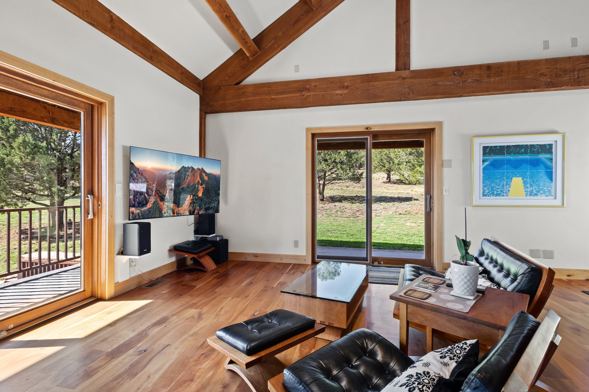 Relax in the Thos. Moser reclining chairs and enjoy a movie on the flat-screen Smart TV.