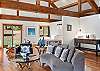 Unwind on the sofa while taking in the spectacular mountain views.
