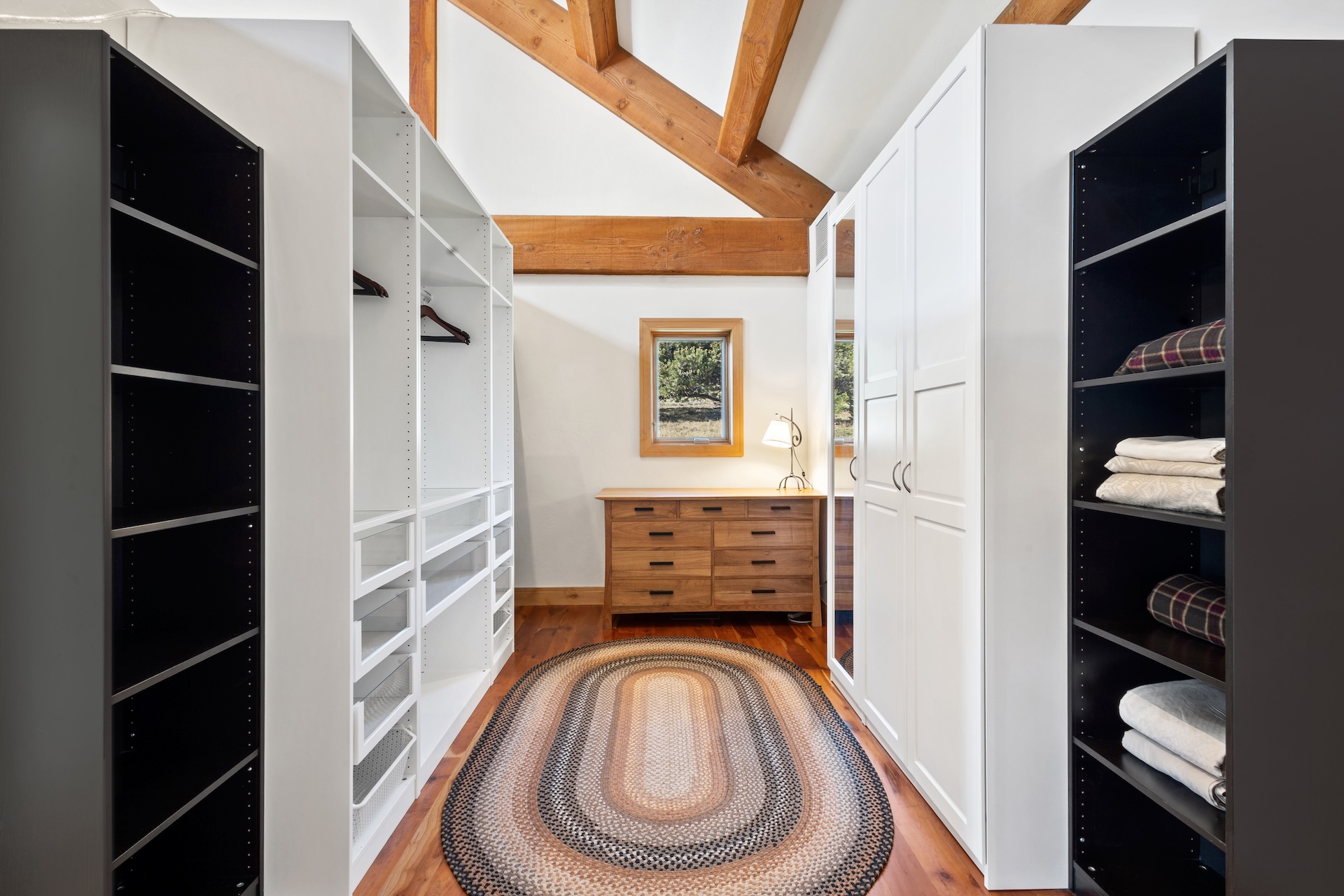 Spacious walk-in closet and dressing area.