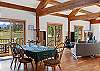 Custom-crafted Thos. Moser cherry dining table with seating for six.