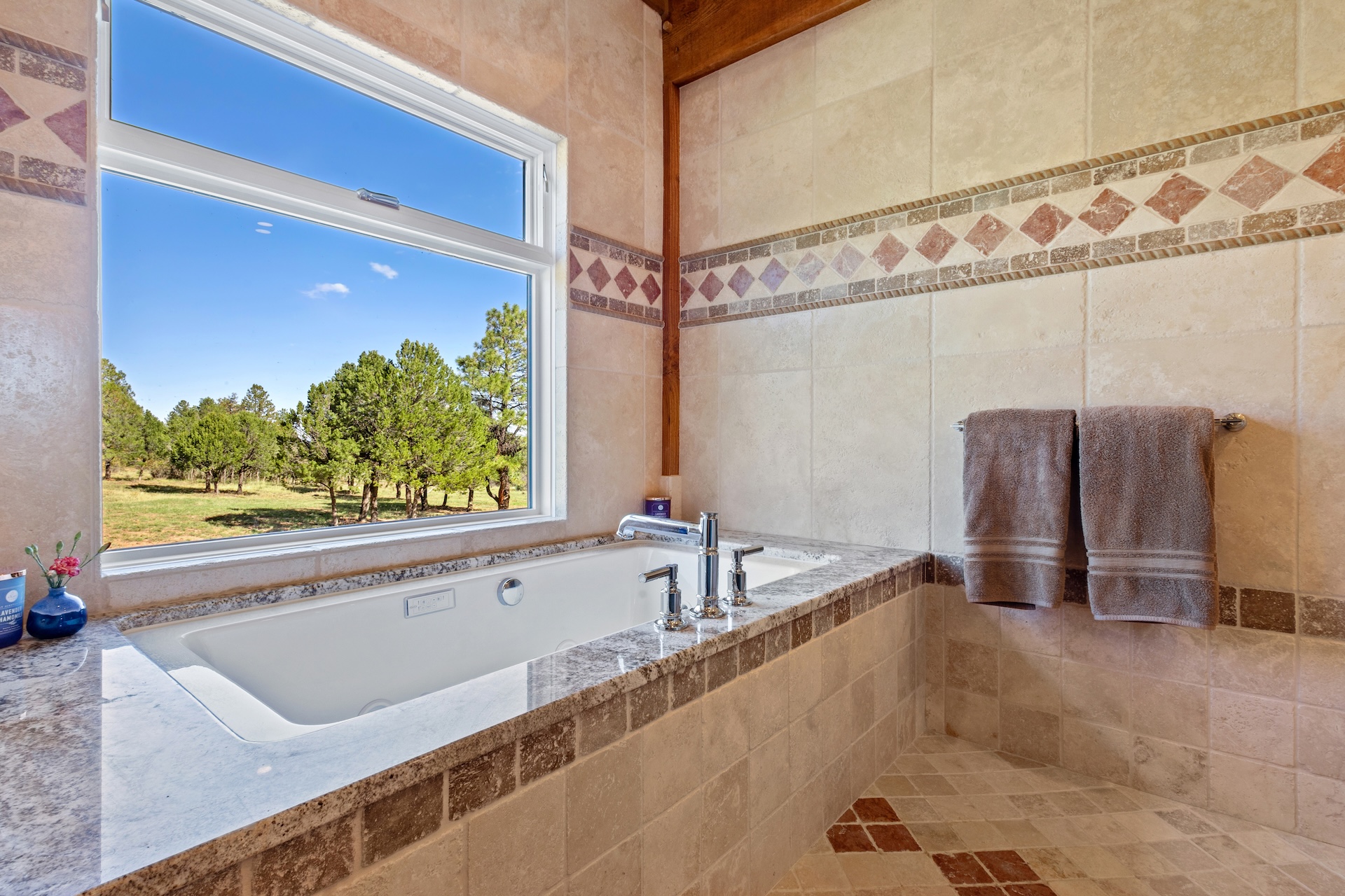 Main spa-inspired bathroom, complete with a whirlpool tub, large walk-in shower, and electric Japanese bidet toilet.