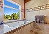 Main spa-inspired bathroom, complete with a whirlpool tub, large walk-in shower, and electric Japanese bidet toilet.
