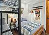 Guest bedroom with full bed and twin-over-twin bunk bed (lower level).