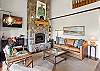 Comfortable living room with gas fireplace and smart TV.
