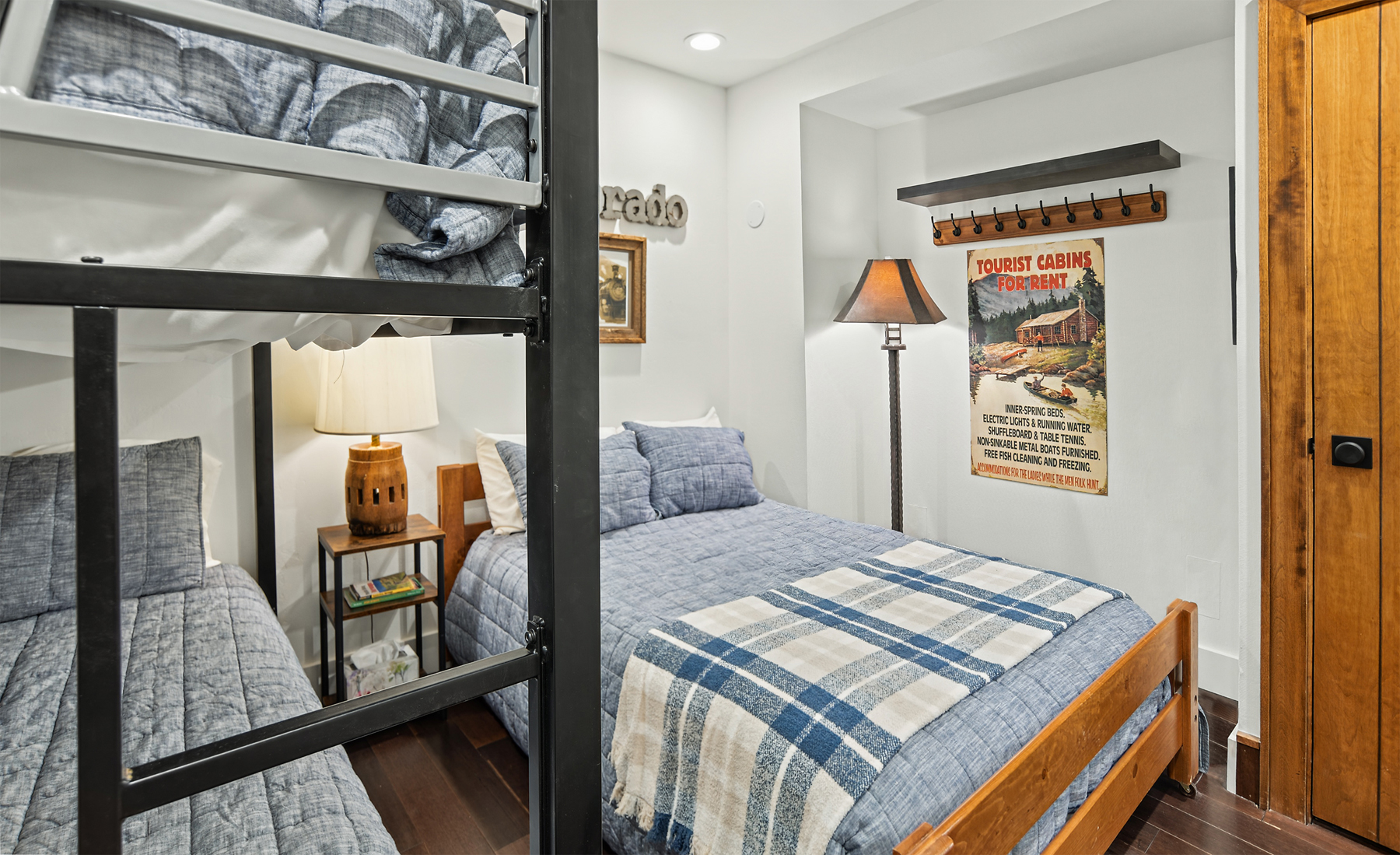 Guest bedroom with full bed and twin-over-twin bunk bed (lower level).
