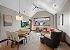 Open dining and living area with plenty of natural light. 