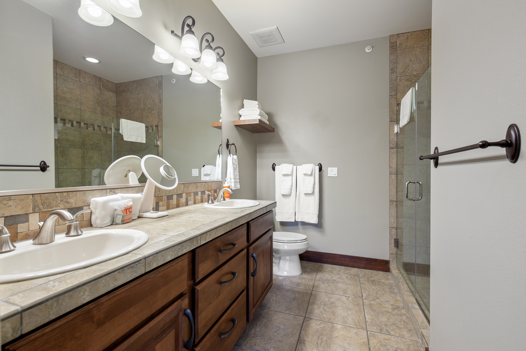 En suite bathroom with tiled walk-in shower.