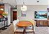 Enjoy meals together around a table that comfortably seats 4.