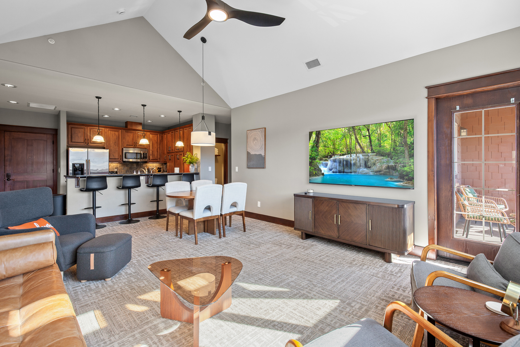 Open dining and living area with plenty of natural light. 