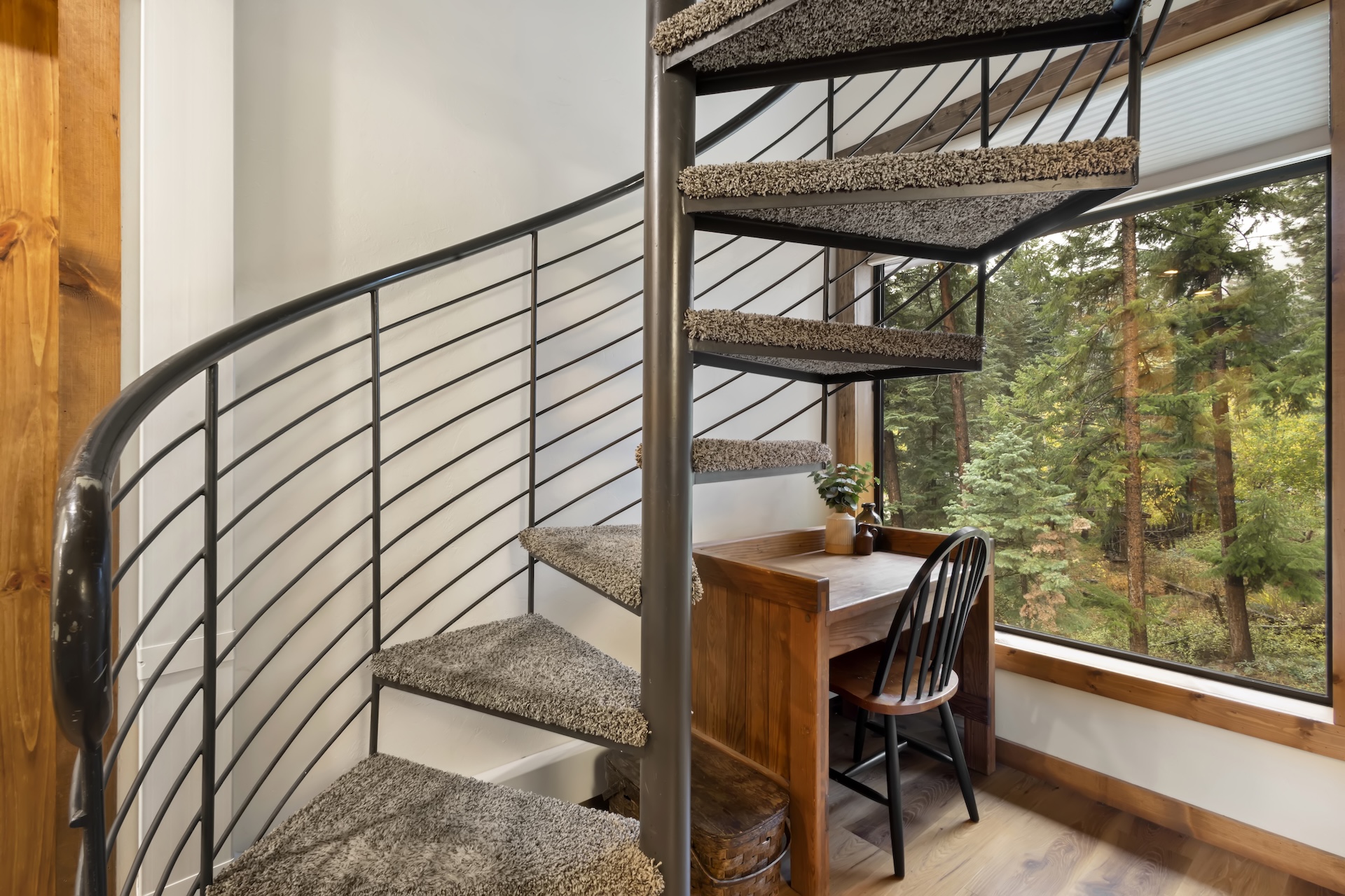 Spiral staircase leading to the 4th floor loft.