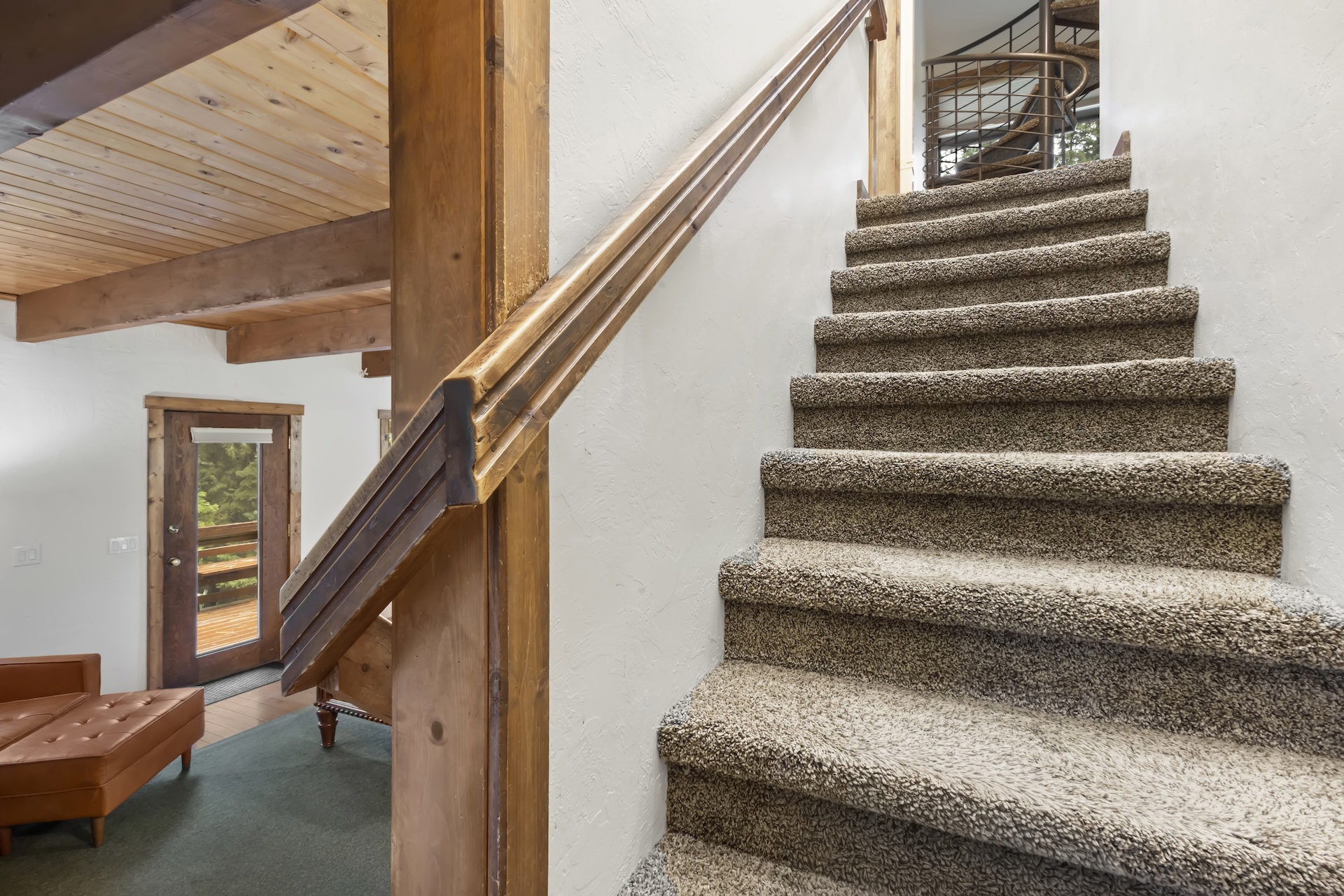 Stairs leading to ground floor suite.