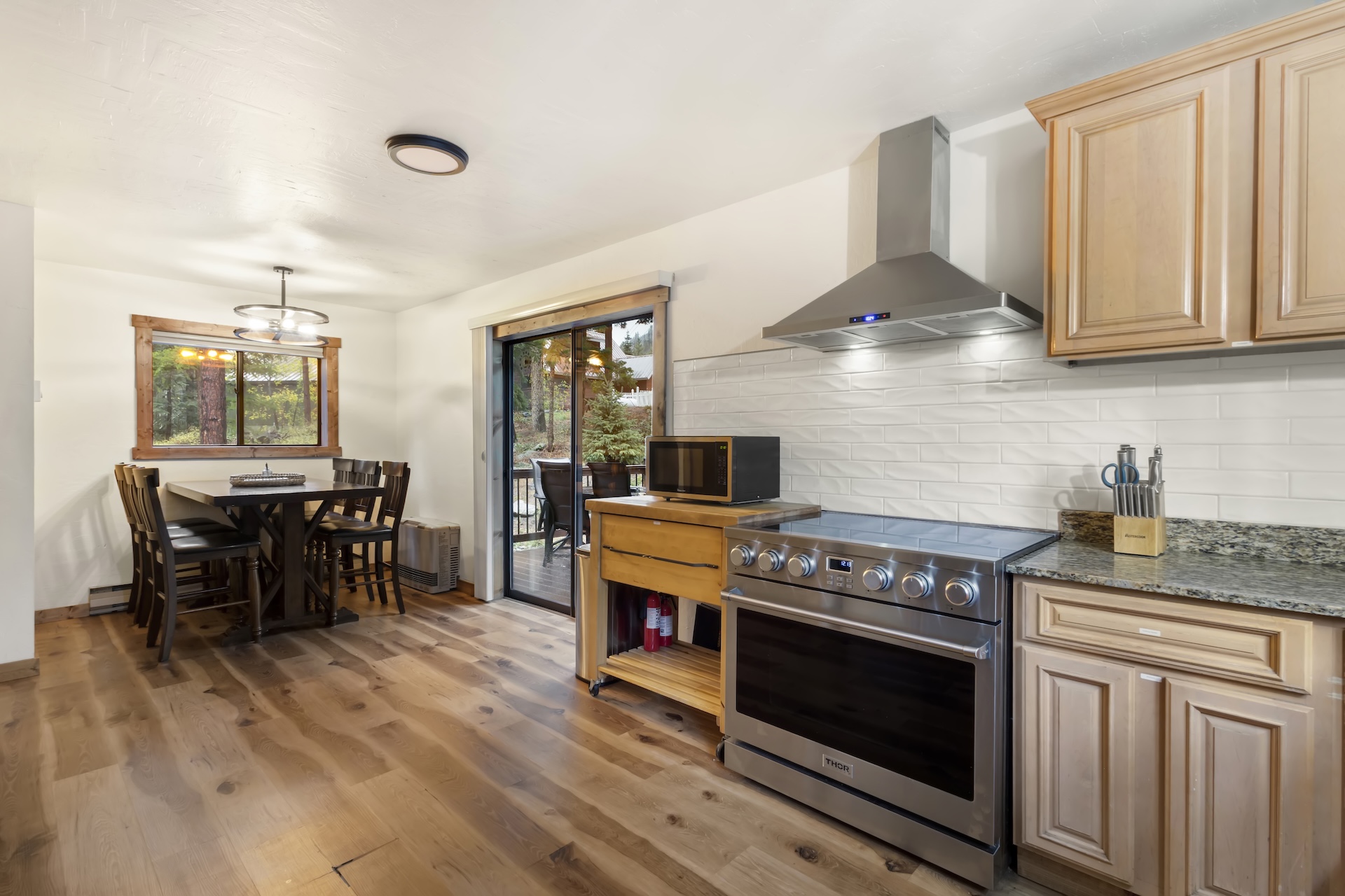 Open concept kitchen with a dining table for 6.