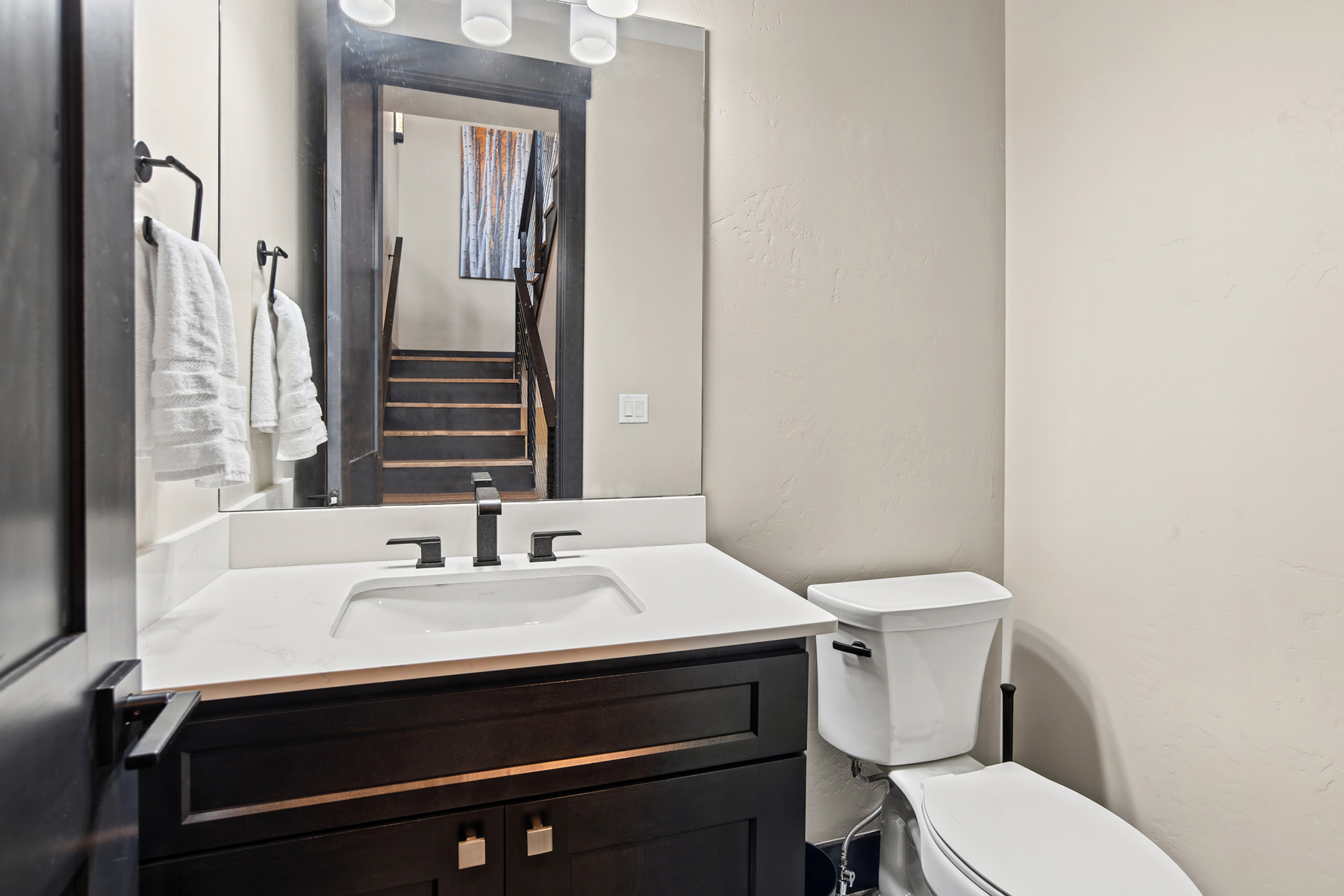 1/2 Bathroom off the Main Living Space